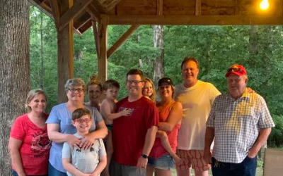 family under park pavilion 